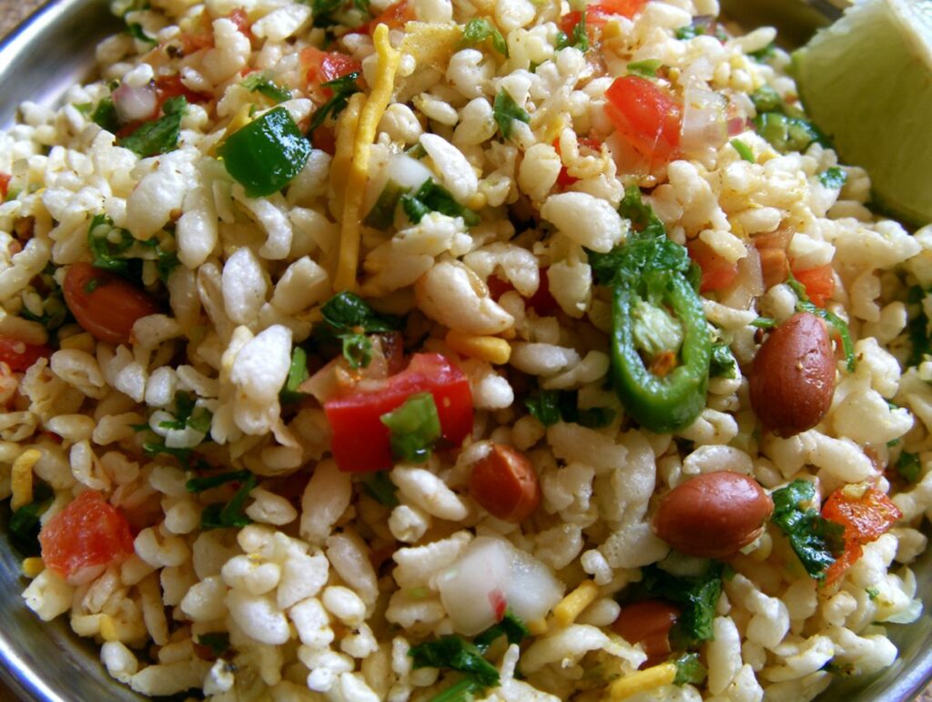 Jhalmuri — puffed rice tossed with mustard oil, onion, chilli and peanuts, River Delta