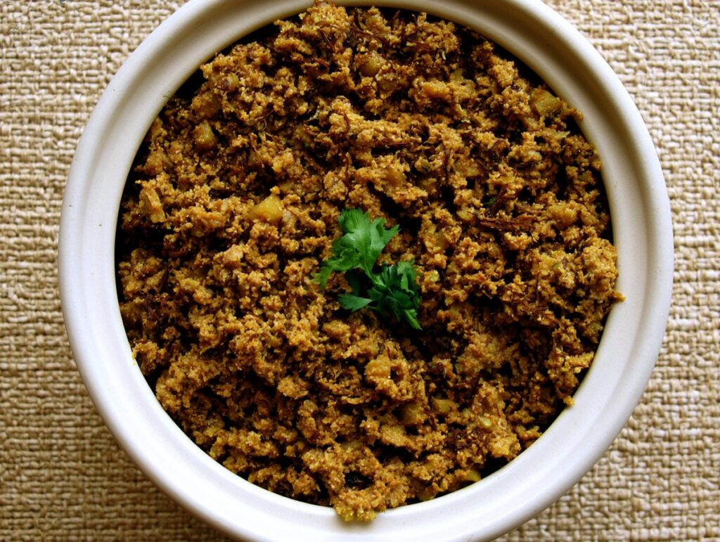 Mochar ghonto — banana blossom cooked with coconut, potato and panch phoron, River Delta