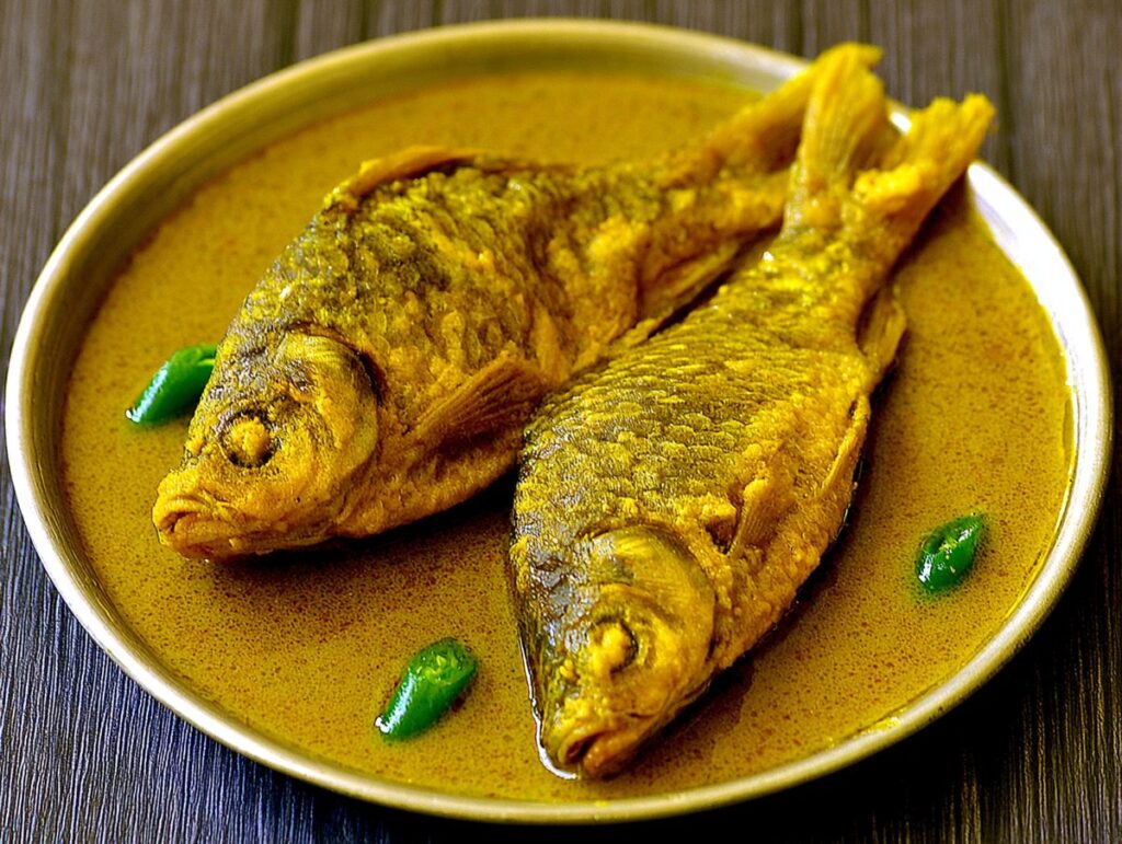 Tel koi — climbing perch fried crisp in mustard oil, Bengal countryside, River Delta